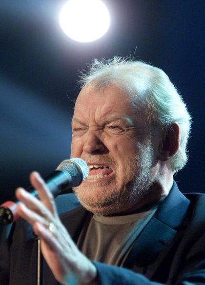 British singer Joe Cocker performs on a television show in Munich in March 2002.