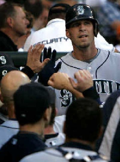 
 Mariners' Richie Sexson gets congratulations for solo home run. 
 (Associated Press / The Spokesman-Review)
