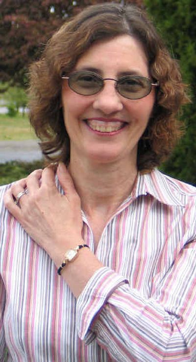 
Therese Walden wears the vintage gold watch she found and paid $10 for at a church rummage sale. Walden had the Lady Elgin watch refurbished and now wears it often.
 (Cheryl-Anne Millsap / The Spokesman-Review)