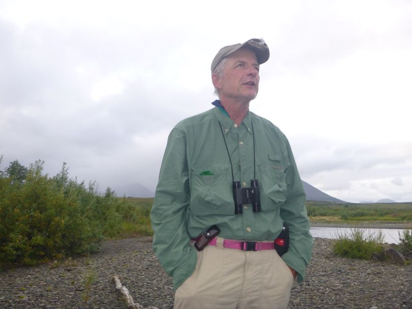 On rare occasions, the weather as nice enough to take off our Gore-Tex waders and rain jackets -- but we never went without our bear spray. (Rich Landers)