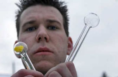 
Mike Conrad, of Spokane, is shown in January  with items that have been sold as novelties, but a revised city ordinance now labels them drug paraphernalia.
 (File / The Spokesman-Review)
