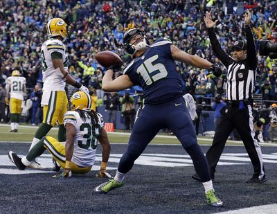Seattle Seahawks’ Jermaine Kearse celebrates after catching the game-winning touchdown during overtime of the NFL football NFC Championship game Jan. 18, 2015, against the Green Bay Packers  in Seattle. (Jeff Chiu / Associated Press)
