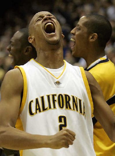 
Cal's Omar Wilkes whoops it up as time ticks away in an upset over Washington. 
 (Associated Press / The Spokesman-Review)