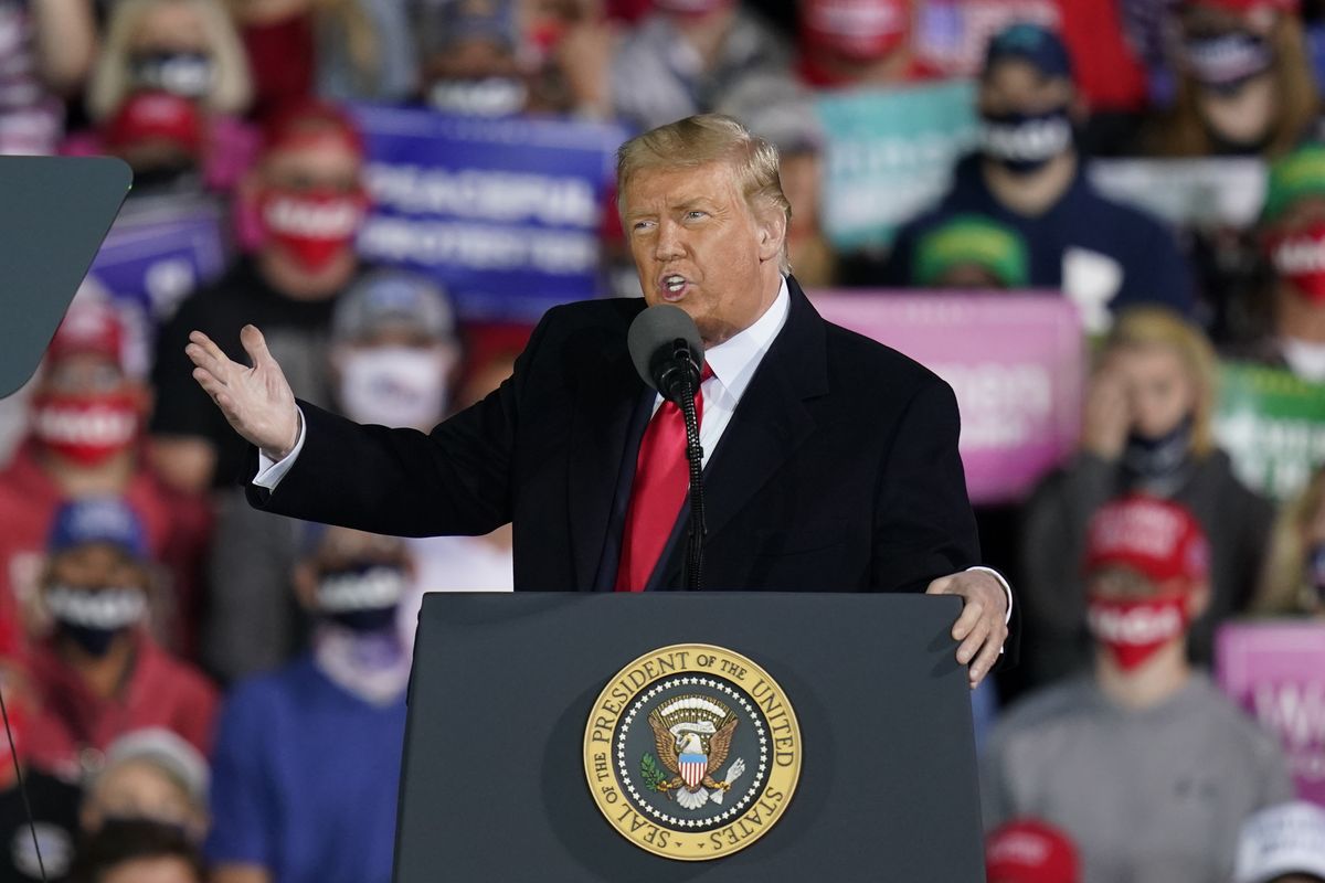 President Donald Trump speaks at a campaign rally at Des Moines International Airport, Wednesday, Oct. 14, 2020, in Des Moines, Iowa. (Charlie Neibergall)
