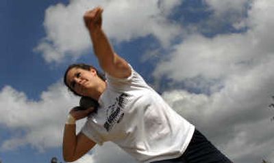 Lakeland High School senior Kristine Leonard prepares to put the shot during practice at the school in Rathdrum last Thursday.
(Kathy Plonka / The Spokesman-Review)
