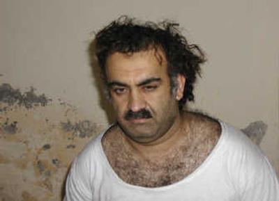 
Khalid Sheikh Mohammed, the alleged Sept. 11 mastermind, is seen shortly after his capture during a raid in Pakistan. The Pentagon plans to seek the death penalty for Mohammed and five other detainees at Guantanamo Bay in connection with the 2001 attacks. Associated Press
 (FILE Associated Press / The Spokesman-Review)