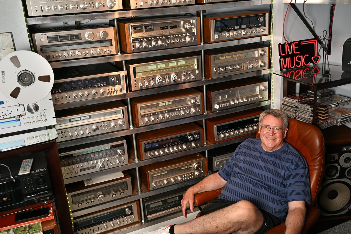 Scott Griffith admits to being obsessed with collecting “monster vintage receivers” and assembling them in his basement, along with the appropriate speakers and players for reel-to-reel tapes, cassettes and vinyl albums, shown Monday, June 9, 2025 in north Spokane. (Jesse Tinsley/THE SPOKESMAN-REVI)