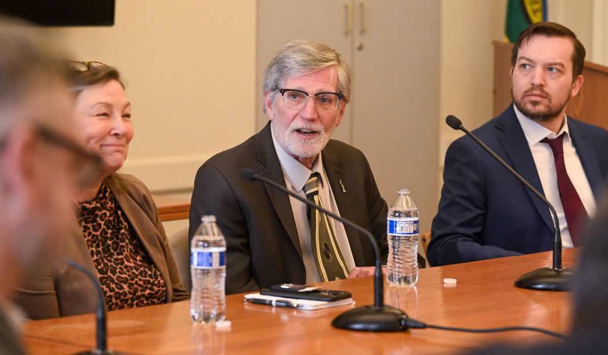 Rep. Timm Ormsby, center, of Spokane answers questions from the media on Feb. 20, 2026, during Legislative Day at the Washington state legislature in Olympia, Washington. To his left is June Robinson, chair of the Senate Ways and Means committee, and Rep. Travis Couture, right, ranking minority member of the Appropriations Committee.  (Jesse Tinsley/THE SPOKESMAN-REVIEW)