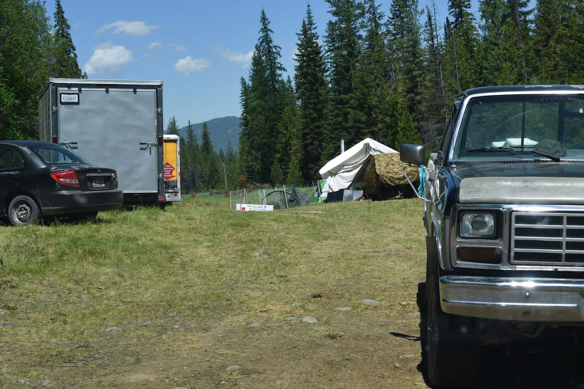 Owen Benjamin’s 10-acre parcel of land had several vehicles and a wall tent present on Wednesday near Bonners Ferry, Idaho.  (Tyler Tjomsland/The Spokesman-Review)