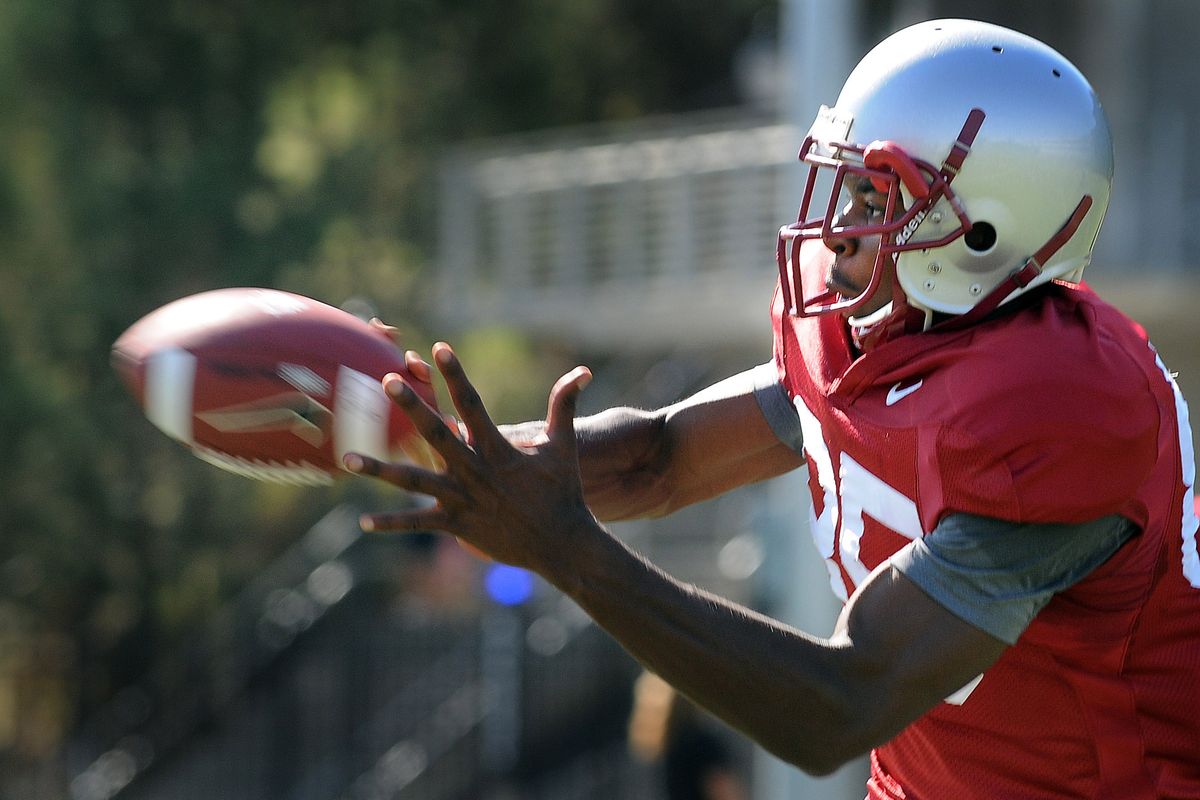 Junior wide receiver Jeshua Anderson pulls in a pass during drills last week. He is nursing a minor hamstring injury now. (CHRISTOPHER ANDERSON / The Spokesman-Review)