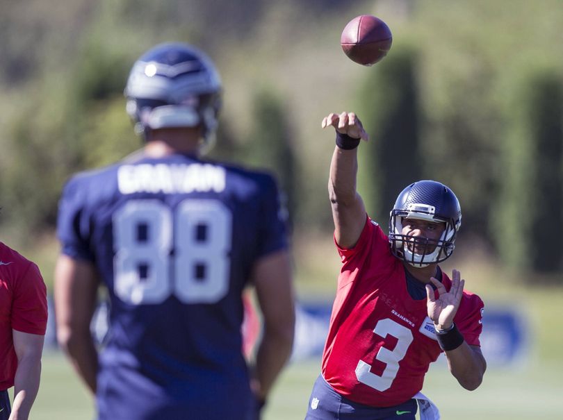 Russell Wilson signed in time to take part in the first day of camp. (Associated Press)