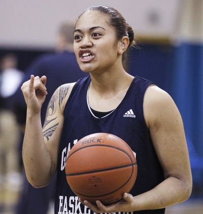Gallaudet's Easter Faafiti uses sign language to communicate with a teammate. (Associated Press)