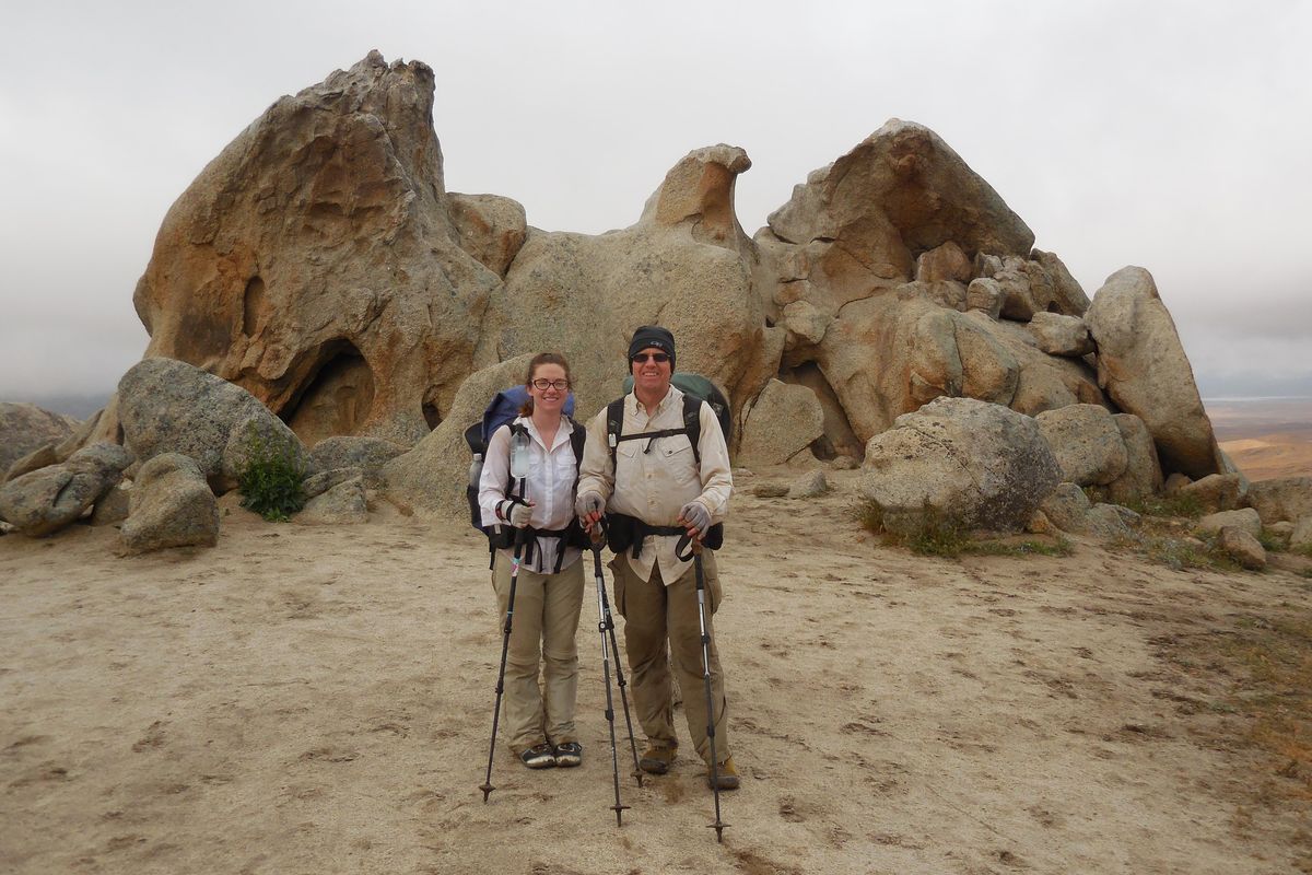 Karra Russell and her father, Kem Russell, of Selah pose for a photo op in front of the aptly-named Eagle Rock in southern California during their through-hike of the Pacific Crest Trail. (COURTESY OF KARRA RUSSELL / Photo courtesy of Karra Russell)