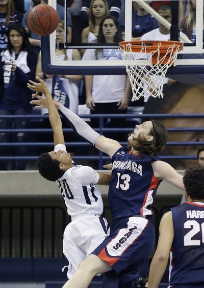 Gonzaga forward Kelly Olynyk blocks the shot of San Diego's Christopher Anderson in the first half of GU's 65-63 win on Feb. 2.  (Associated Press)