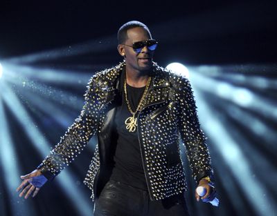 R. Kelly performs June 30, 2013, at the BET Awards in Los Angeles. Kelly has asked the Chicago judge to let him travel overseas for concerts in Dubai, saying he’s been unable to get work anywhere in the U.S. since his arrest on charges he sexually abused three minor girls and an adult woman. (Frank Micelotta / Frank Micelotta/Invision/AP)