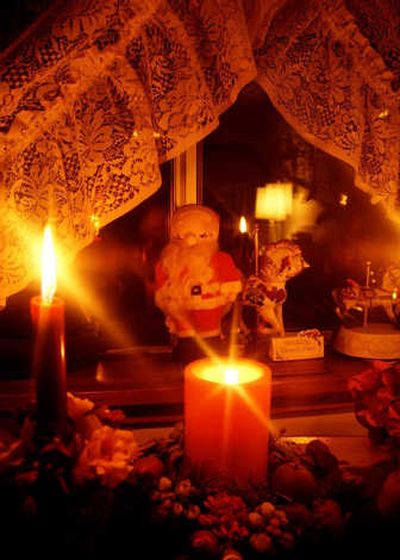 
Remember just a few things to make your holidays comfortable and safe, like keeping candles away from curtains.
 (File Photo / The Spokesman-Review)