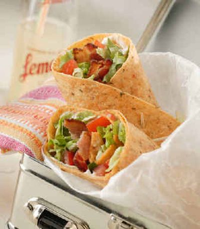 
Used to ordering or making the popular BLT on toasted white, rye or whole wheat? Try our Bacon, Lettuce and Tomato Wrap, using tortillas and thick-cut peppered bacon. And vary the fillings.
 (King Features Syndicate / The Spokesman-Review)