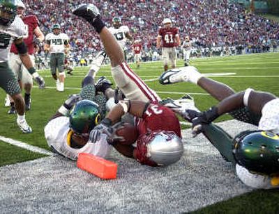 
Dwight Tardy bowled over some Ducks last season in Pullman. 
 (File / The Spokesman-Review)