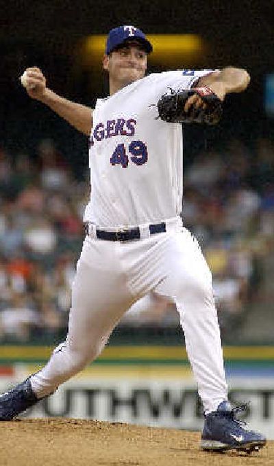 
Rookie Chris Young pitches against Seattle. 
 (Associated Press / The Spokesman-Review)