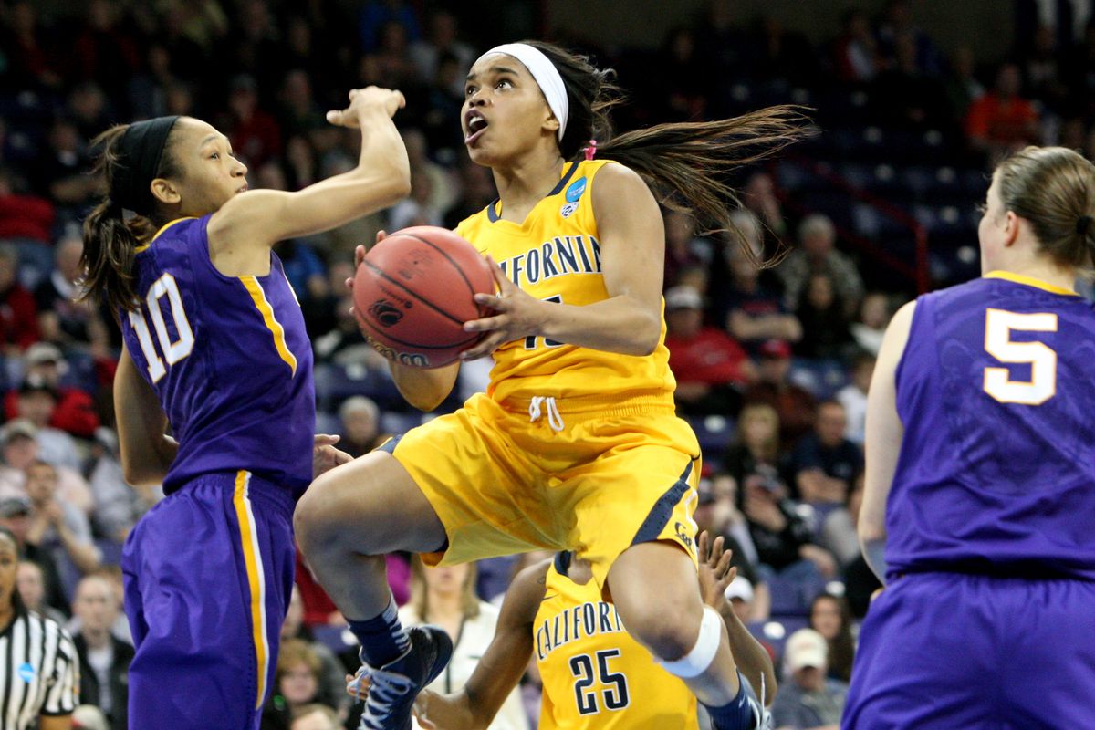 California guard Brittany Boyd, right, soars past Adrienne Webb and toward the basket to score. She finished with 14 points. (Tyler Tjomsland)