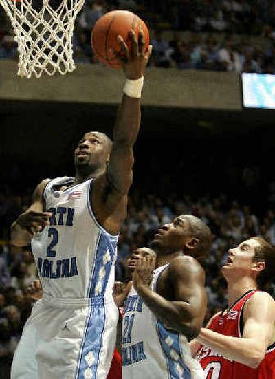 UNC's Raymond Felton scores on his way to 1,000 for his career.
(Associated Press / The Spokesman-Review)