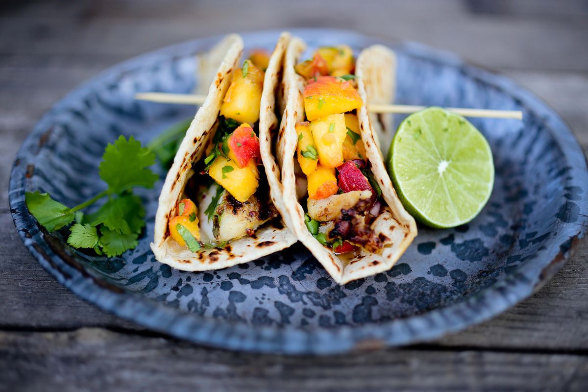 Grilled fish tacos with peach salsa. (Photo Fountaine / The Spokesman-Review)