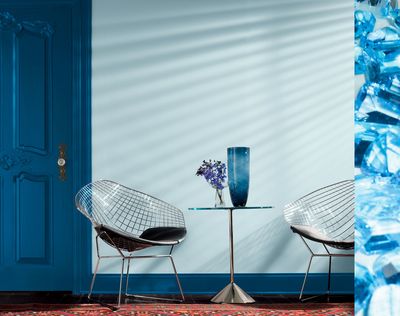 The door and trim are painted with Valspar Signature’s Celestial Blue, available at Lowe’s, to create contrast while adding drama and architectural detail to further personalize the space.
