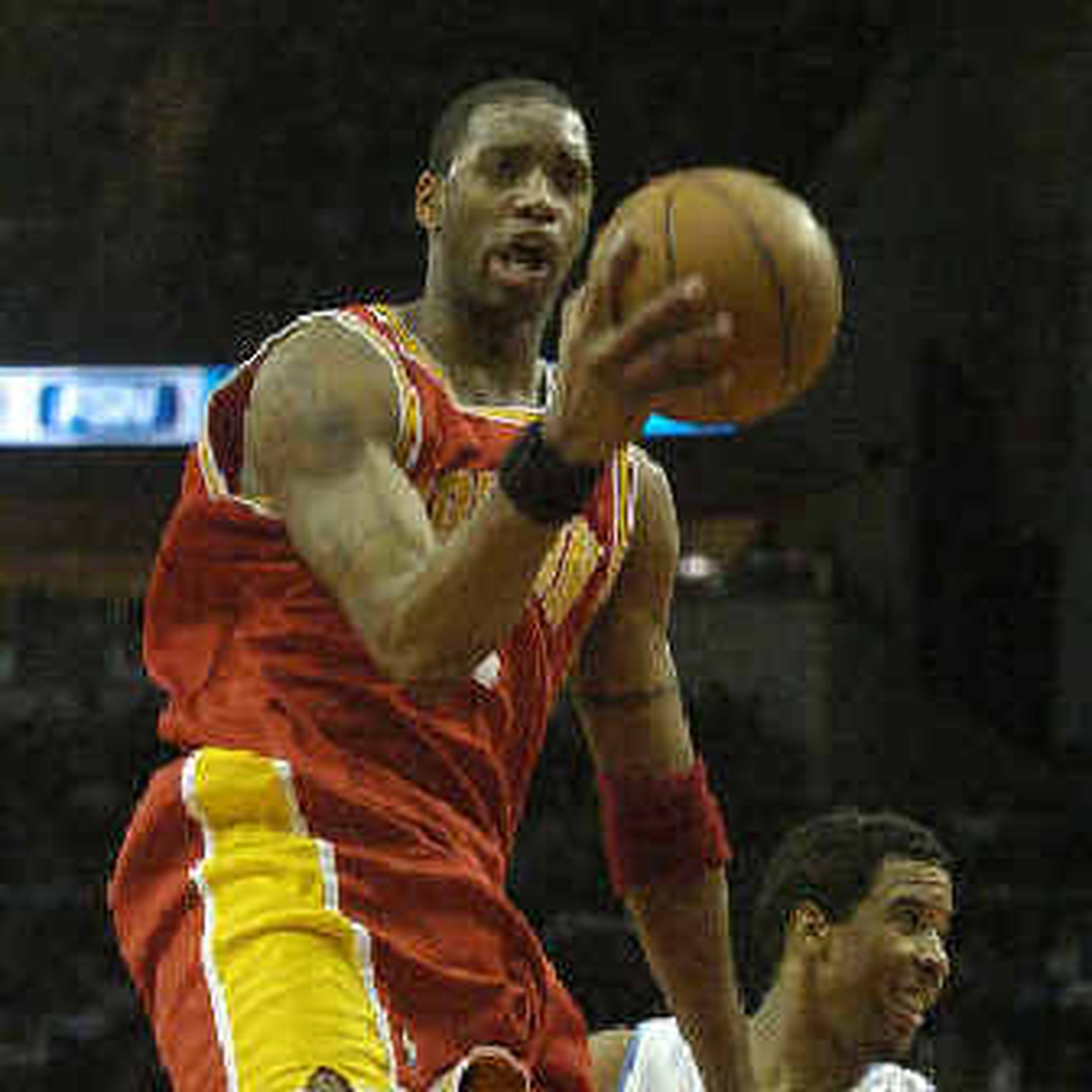 McGrady's 38 help Rockets end skid