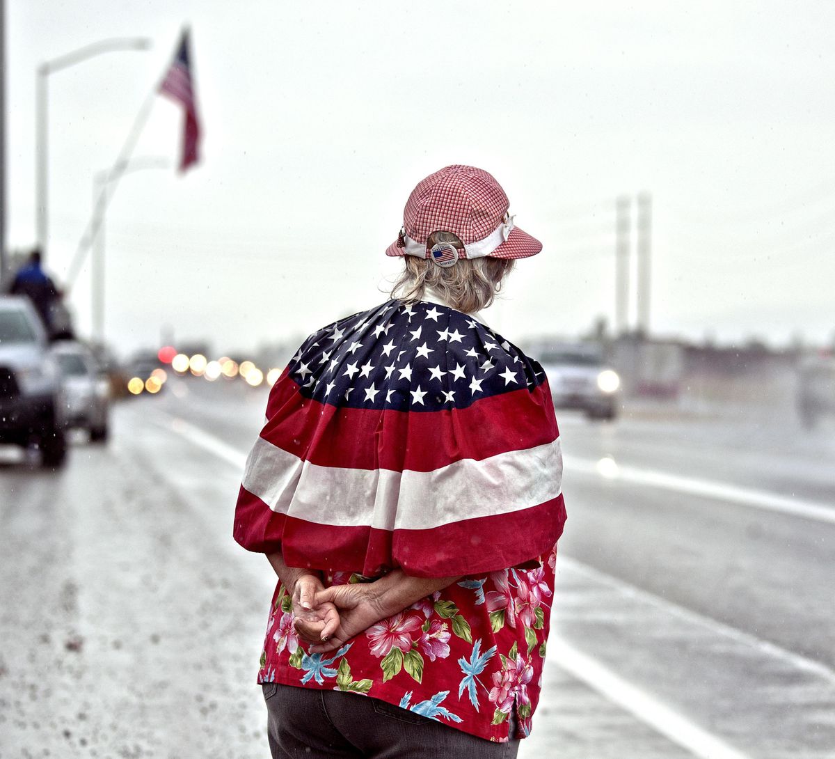 "A little rain is nothing compared to what he went through," said Glenda Boerner of Rathdrum, during the welcome home escort for Army Sgt. 1st Class Brian Sharp in Hayden, Id. on Friday, Aug. 30, 2019. Brian, a Green Beret, was injured in a battle in Afghanistan and later awarded the Purple Heart. (Kathy Plonka / The Spokesman-Review)