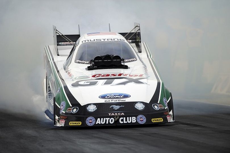 John Force ended a 19-race No. 1 qualifying slump by racing to a track record performance in Funny Car at the 25th annual NHRA Kansas Nationals.