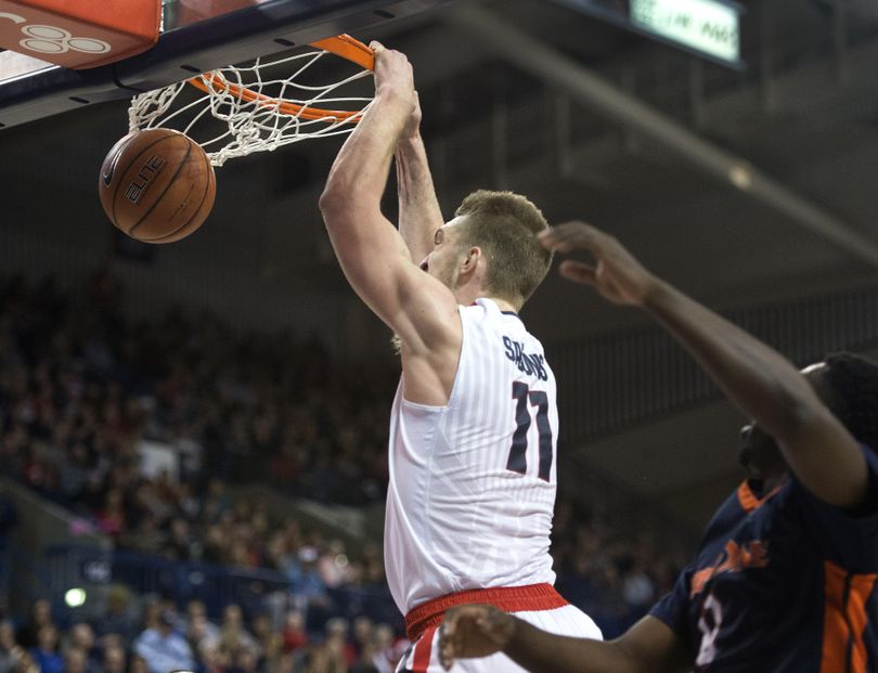 Gonzaga's Domantas Sabonis took a no-look-pass from teammate Josh Perkins for a slam dunk in the first half, Monday, Dec. 21, 2015, in Spokane, Wash. (Dan Pelle / The Spokesman-Review)