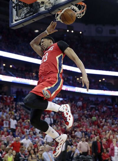 Anthony Davis’ 31 points helped New Orleans net a playoff berth. (Associated Press)