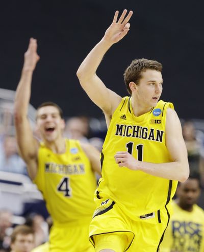 Michigan’s Nik Stauskas hit all six 3s, scored 22 points. (Associated Press)