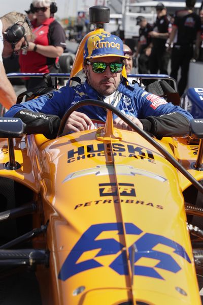 Fernando Alonso, of Spain, climbs into his car during practice for the Indianapolis 500 IndyCar auto race at Indianapolis Motor Speedway, Wednesday, May 15, 2019, in Indianapolis. (Michael Conroy / Associated Press)