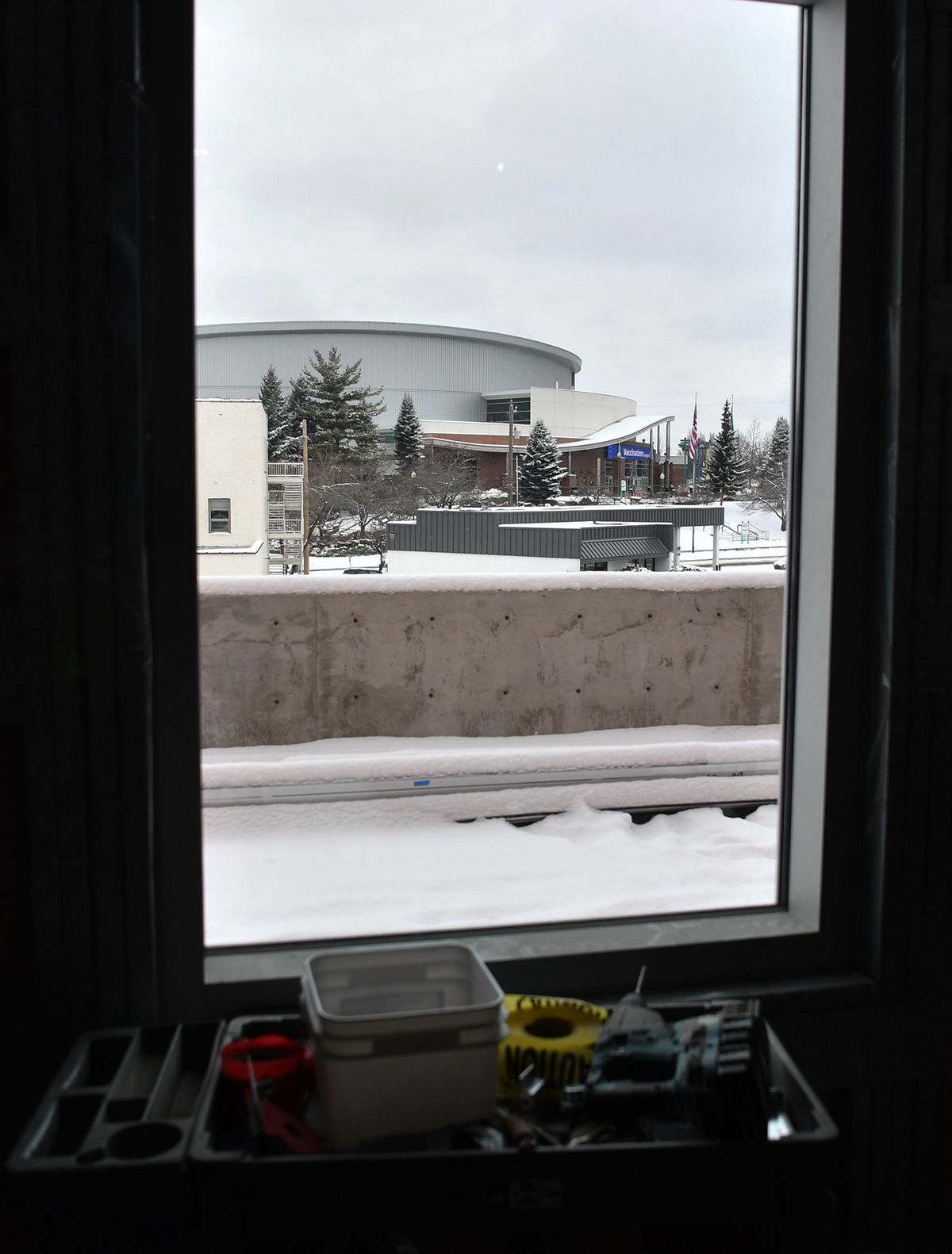 The Spokane Arena is visible from a window in The Podium during media tour of the facility Tuesday.  (Tyler Tjomsland/THE SPOKESMAN-REVIEW)