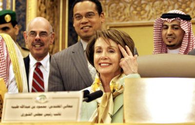 
U.S. House Speaker Nancy Pelosi sits in the seat  of the vice chairman of the Saudi consultative council in Riyadh, Saudi Arabia, on Thursday. 
 (Associated Press / The Spokesman-Review)