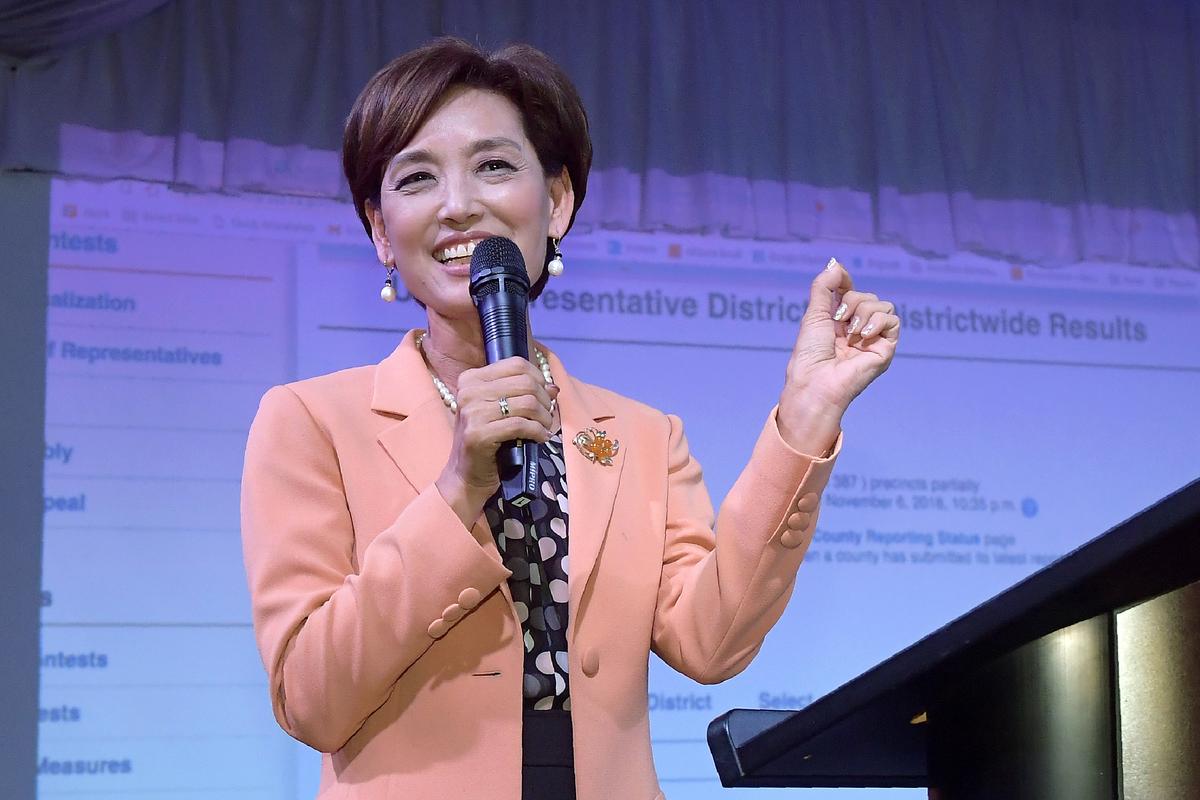 FILE - In this Nov. 6, 2018, file photo, Young Kim, then a Republican candidate for the 39th Congressional District in California, speaks to supporters in the Rowland Heights section of Los Angeles. This year, Kim narrowly defeated Democratic Rep. Gil Cisneros in a Southern California district the GOP lost two years ago. Kim, a former state legislator, won her rematch with Cisneros and gave Republicans their second House victory over a Democratic incumbent in Orange County this election. (Mark J. Terrill)