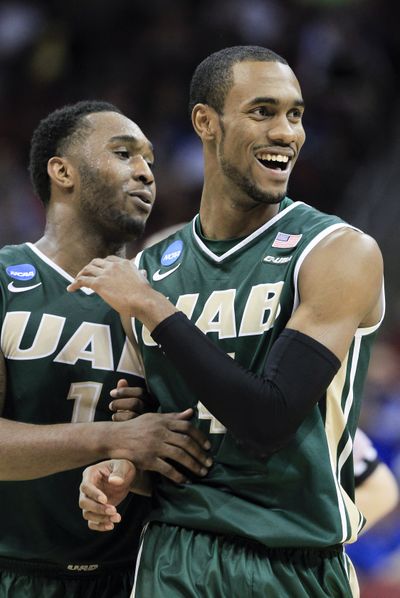 UAB’s Denzell Watts, left, and Robert Brown celebrate. (Associated Press)