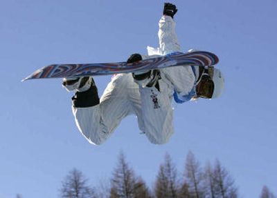 
Hannah Teter of the United States jumps during a training session for the Women's Olympic Snowboard Half Pipe competition in Bardonecchia, Italy, on Friday. 
 (Associated Press / The Spokesman-Review)