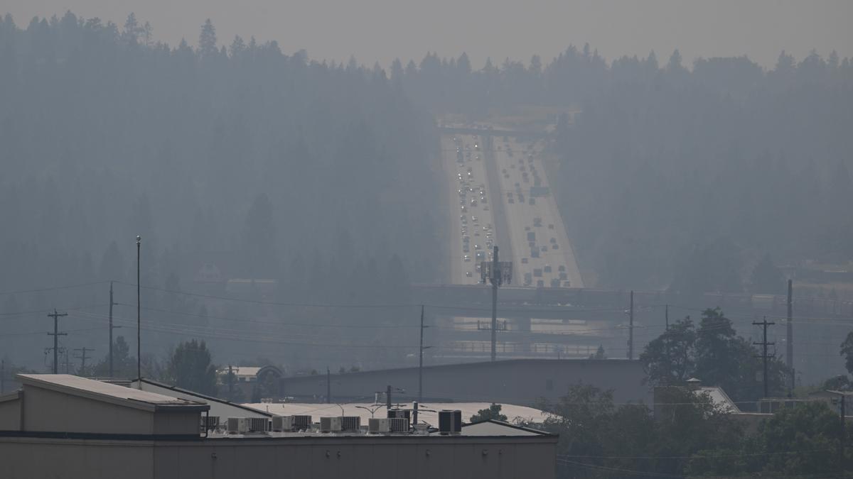 Wildfire smoke obscures the view of I-90