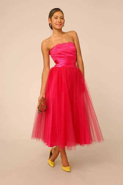 
One way to modernize a classic prom style is to add brightly colored accessories. These looks are featured in an online fashion show on RED, AOL's teen service. 
 (Associated Press photos / The Spokesman-Review)