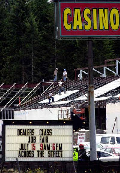 Construction crews work on part of a $31 million casino expansion on the Nisqually Indian reservation near Yelm, Wash. Despite nationwide economic malaise last year, tribal casino revenue increased by 12 percent, according to a new report.
(Richard Roesler/ / The Spokesman-Review)