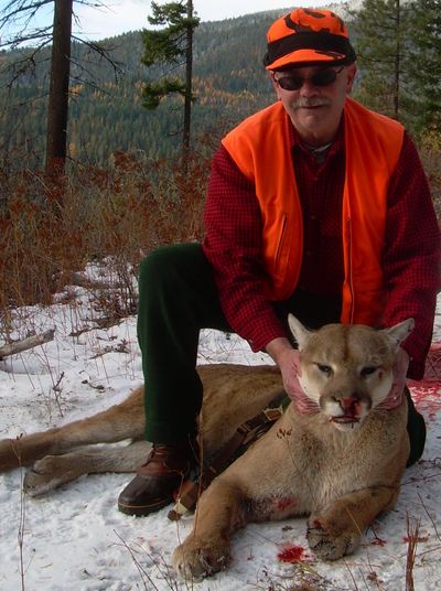 Gary Penrod with cougar he shot while deer hunting in Pend Oreille County.
 (Courtesy photo)