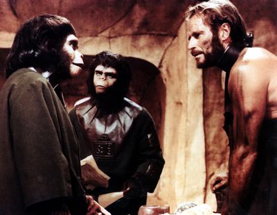 From left, Kim Hunter, Roddy McDowall and Charlton Heston in “Planet of the Apes.” The 1968 movie launched a film franchise, and this week, the 10th “Planet of the Apes” entry bows in theaters, “The Kingdom of the Planet of the Apes.” (Globe Photos)
