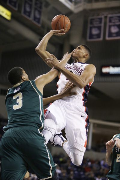 Gonzaga’s Angel Nunez, right, shooting over Sacramento State’s Justin Strings, will have his own cheering section at the Garden. (Associated Press)