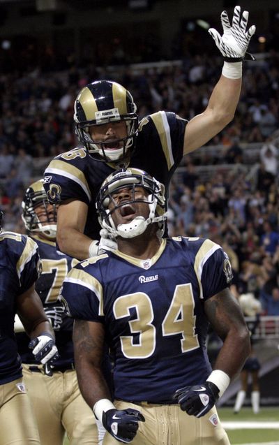 St. Louis Rams running back Kenneth Darby celebrates after scoring a touchdown. (Associated Press)