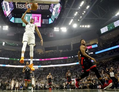 Milwaukee Bucks’ Giannis Antetokounmpo dunks during the first half of Game 1 of the NBA Eastern Conference basketball playoff finals against the Toronto Raptors Wednesday, May 15, 2019, in Milwaukee. (Morry Gash / Associated Press)