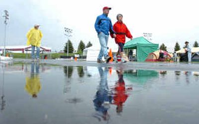 
James and Cricket Pierce join the other fund-raisers for the annual Relay for Life at the Greyhound Park in Post Falls on Saturday. 
 (Jesse Tinsley / The Spokesman-Review)