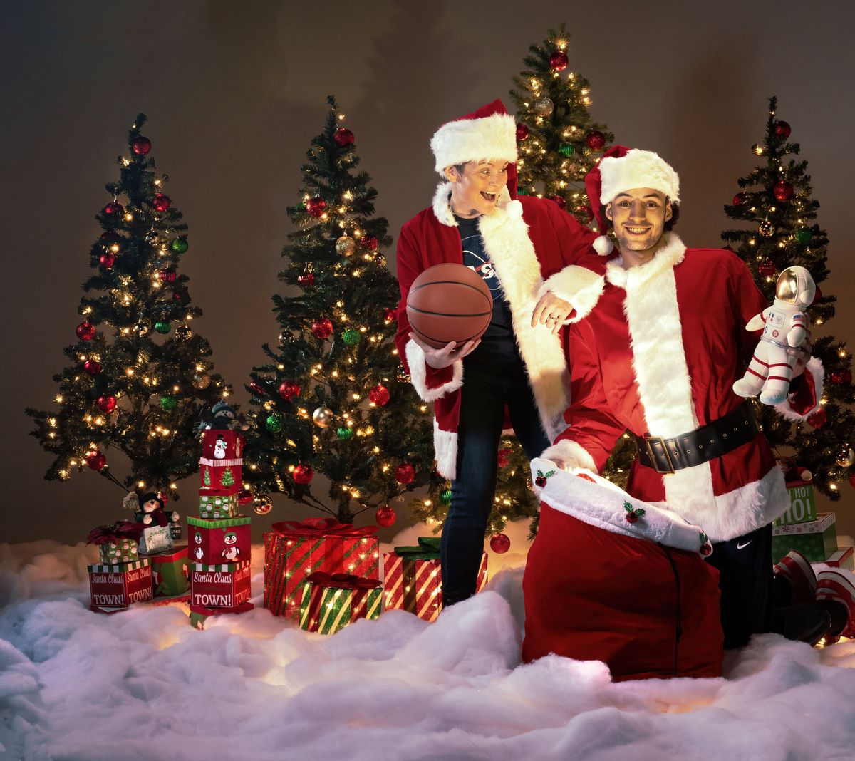 2022: Spokane natives NASA astronaut Ann McClain and Gonzaga University basketball player Anton Watson (2019-24) get into the holiday spirit.  (COLIN MULVANY/THE SPOKESMAN)