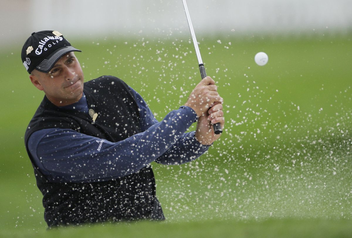 Rocco Mediate hits from a greenside bunker on Bethpage State Park’s Black Course. (Associated Press / The Spokesman-Review)